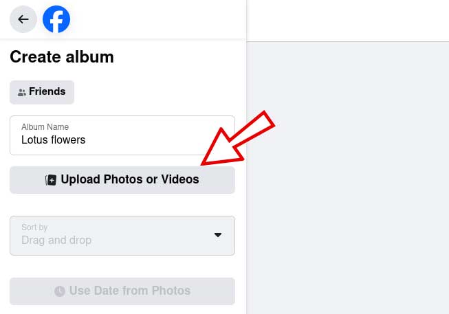 Click the Upload Photos or Videos button